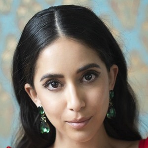 Andy Chavez De Moore, 37 (TV Show Host)