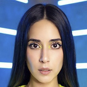 Andy Chavez De Moore, 37 (电视节目主持人)