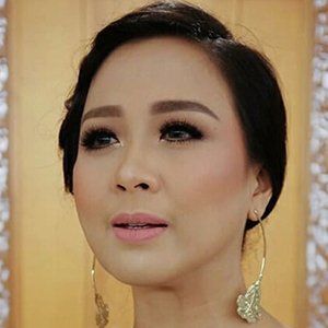 Astrid Sartiasari, 43 (Pop Singer)