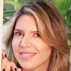 Cintia Cunha, 44 (Doctor)