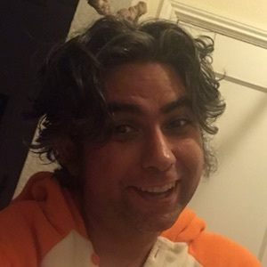 Justin Robert Young, 42 (Podcast Host)