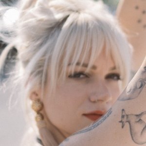 Lillie Mae, 34 (Folk Singer)