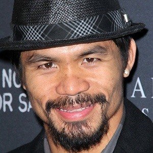 Manny Pacquiao, 45 (Boxeador)