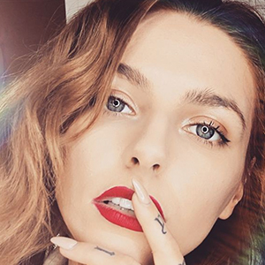 Marta Popescu, 33 (Photographer)