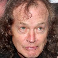 Angus Young, 68 (Guitarist)