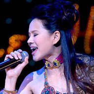 Annie Yi, 56 (Pop Singer)