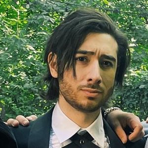 Cos Sylvan, 35 (贝斯手)