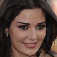 Cyrine Abdelnour, 47 (World Music Singer)
