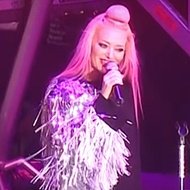 Delia Matache, 42 (Pop Singer)