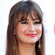 Ellie Crisell, 49 (Journalist)