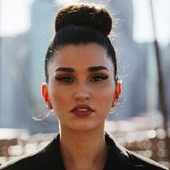 Enisa, 29 (Pop Singer)