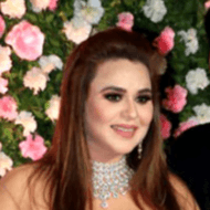 Ginni Chatrath, 34 (Family Member)