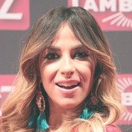 Gulcan Kamps, 43 (TV Show Host)