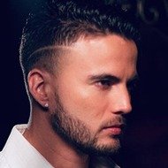 Gustavo Elis, 35 (Pop Singer)