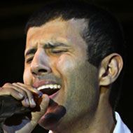Hamza Namira, 44 (World Music Singer)