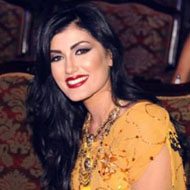 Helly Luv, 36 (Pop Singer)