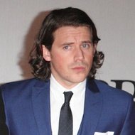 Jamie Cook, 38 (Guitarist)