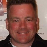 Johnny Brennan, 63 (Synchronsprecher)