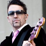 Johnny Colt, 55 (Bassist)
