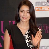 Kahi, 43 (Pop Singer)