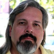 Ken Mora, 64 (Screenwriter)