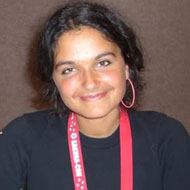 KT Gray, 43 (stemactrice)