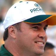 Mike McCarthy, 60 (Coach de football)