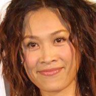 Na Ying, 56 (Pop Singer)