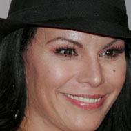 Olga Tañón, 58 (Pop Singer)