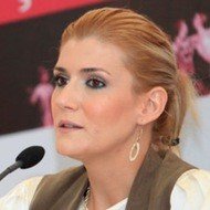 Ozge Uzun, 46 (Journalist)