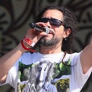 Quique Neira, 52 (世界音樂歌手)