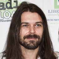 Simon Neil, 46 (Rock Singer)