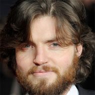 Tom Burke, 42 (Attore TV)