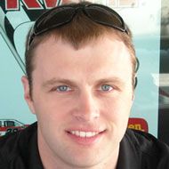 Travis Kvapil, 48 (Race Car Driver)