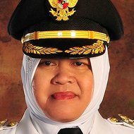Tri Rismaharini, 64 (Politician)