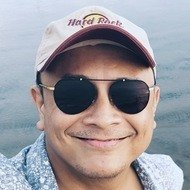 Unggul Santosa, 49 (Photographer)