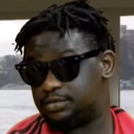 Wande Coal, 38 (Popsänger)