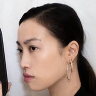 Yi Zhou, 38 (Director)